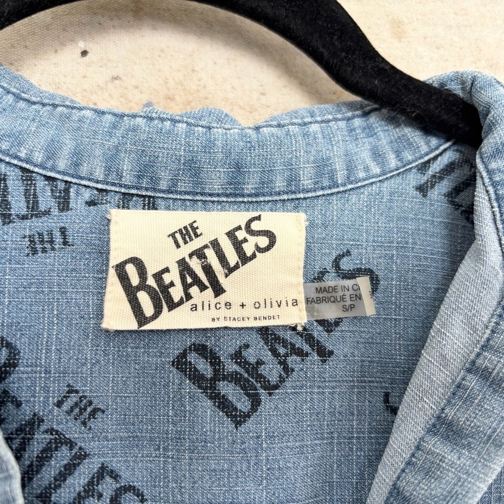 Alice + Olivia x The Beatles I Want to Hold Your Hand Chambray Top - Picture 4 of 5